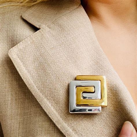 givenchy brooch vintage.